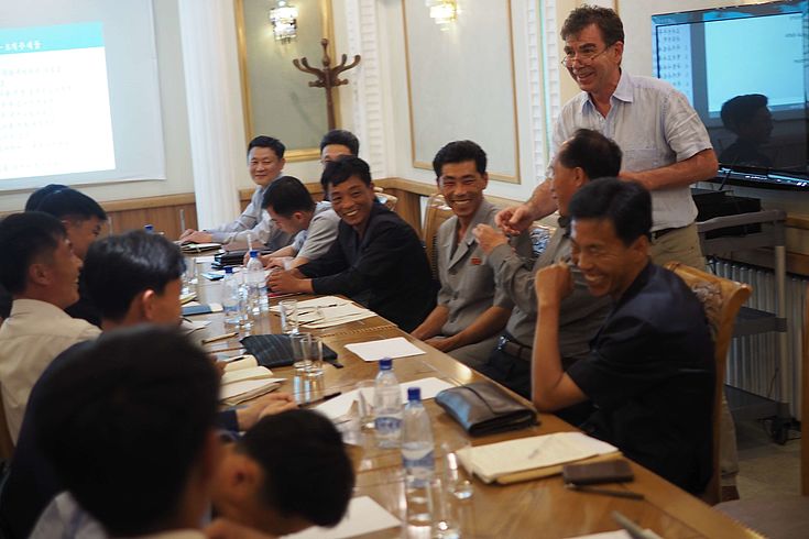 Dr. Heino Polley discusses measures for nature conservation with North Korean forest experts.
