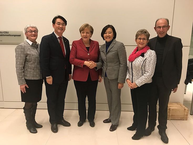 Foto mit Bundeskanzlerin Merkel